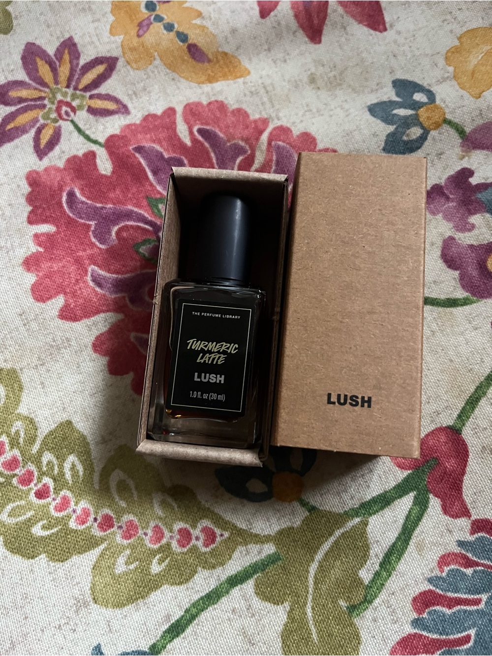Lush Turmeric Latte Perfume Oil in Brown Glass Bottle with Black Cap